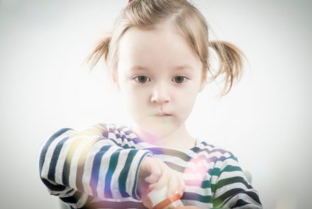 Kind mit Seifenblase