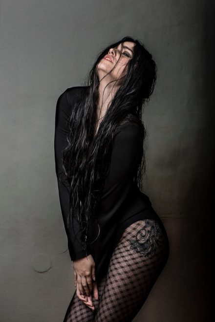 Foto Frau mit Netzstrumpfhose