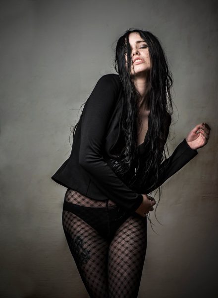 Foto Frau mit Netzstrumpfhose